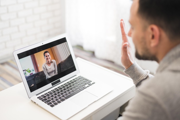 person talking on a video call for teletherapy